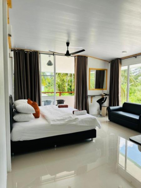 Thoddoo White Sand Inn
